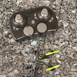 Black and Green Drone with Controller